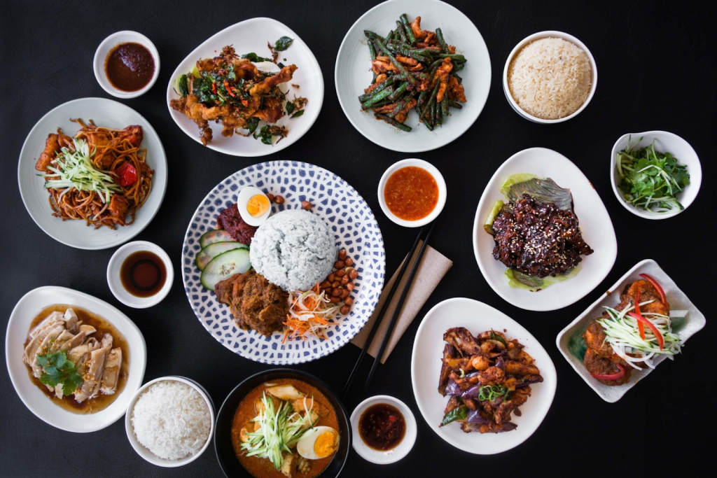 Malaysian cuisine near Sogo Kuala Lumpur with nasi lemak and curry, close to hotels near Sogo KL in the city centre.
