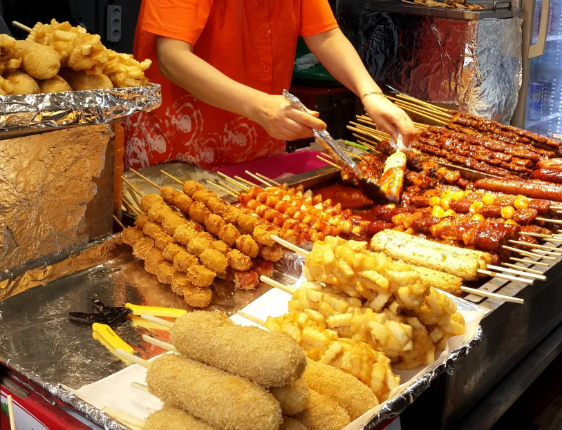Street food in Seoul, which includes corndogs and barbecues